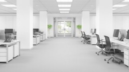 An empty office with multiple empty desks and workstations. My Office Apps is here to work with businesses just like these.