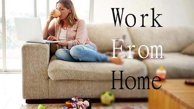 woman working from home on couch